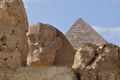 The Great Sphinx of Egypt and The Great Pyramid detail Royalty Free Stock Photo