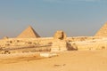 Great Sphinx of Giza in front of pyramids Royalty Free Stock Photo