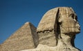 Great Sphinx of Giza with Great Pyramid of Pharaoh Khufu, Giza, Cairo (Egypt) Royalty Free Stock Photo