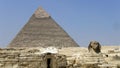 The Great Sphinx with a pyramid of Giza - Cairo - Egypt Royalty Free Stock Photo