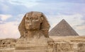 Great Sphinx and Pyramid of Khafre. Sphinx and the Great pyramid in Egypt. The Sphinx in Giza pyramid complex at sunset. ancient Royalty Free Stock Photo