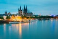 Great St. Martin Church And Dom In Cologne At Evening With Reflection In River Rhine, Germany