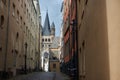 Great St Martin Church seen from an antique and medieval buildings street, Germany