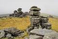 Great Staple Tor with mist rolling in over the hills, Dartmoor National Park, Devon Royalty Free Stock Photo