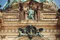 Great stone Jesus on the top of facade of the Berliner Dom