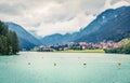 Great summer view of Auronzo di Cadore and its lake in province of Belluno, Veneto, Italy. Dramatic morning scene of Dolomite Alps Royalty Free Stock Photo