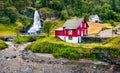 Great summer view with Large, popular waterfall Steinsdalsfossen on the Fosselva River. Picturesque morning scene of  village of Royalty Free Stock Photo