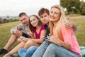 Great sunny day with best friends in park. Positive emotions. Royalty Free Stock Photo