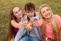 Great sunny day with best friends in park. Positive emotions. Royalty Free Stock Photo