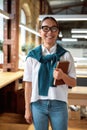 Great things for great works. Confident asian female office worker posing indoors