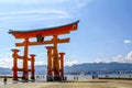 The great Torii Red at Itsukushima Shrine is a Shinto shrine on the island of Itsukushima aka Miyajima at low tide Royalty Free Stock Photo
