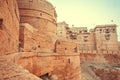 Great towers of historical Jaisalmer fort with monumental stone walls over the old city, India Royalty Free Stock Photo