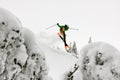 great view of athlete skier jumping over slopes of snow-capped mountains Royalty Free Stock Photo