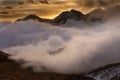 Great view of the foggy valley in Gran Paradiso National Park, Alps, Italy, dramatic scene, beautiful world. colourful autumn Royalty Free Stock Photo