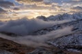 Great view of the foggy valley in Gran Paradiso National Park, Alps, Italy, dramatic scene, beautiful world. colourful autumn morn Royalty Free Stock Photo