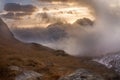 Great view of the foggy valley in Gran Paradiso National Park, Alps, Italy, dramatic scene, colourful autumn morning Royalty Free Stock Photo