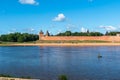 Russia, Veliky Novgorod, August 2021. Kremlin wall and beach near the Volkhov river.