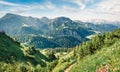 Great view from top of cableway above the Konigsee lake on Schneibstein mountain ridge. Bright summer morning on a border of