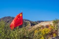 The Great Wall of China on the background and chinese red flag BANNER, LONG FORMAT Royalty Free Stock Photo