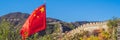 The Great Wall of China on the background and chinese red flag BANNER, LONG FORMAT Royalty Free Stock Photo