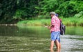 Great way to spend time outside with family and friends. Men fishing. Fisherman family at river. Rod tackle. Fishing Royalty Free Stock Photo