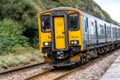 Class 150 GWR local train travelling towards cornwall at teignmouth