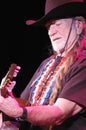 Willie Nelson in Cowboy Hat Playing Guitar Royalty Free Stock Photo