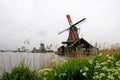 Windmill of netherland in coast Royalty Free Stock Photo