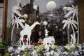 A great window design was observed for the holidays in London. balloons, elephants, Giraffe,little girl and palms, and Christmas Royalty Free Stock Photo