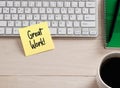 Great work message handwritten on a sticky note paper on the office desk Royalty Free Stock Photo