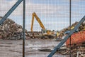 A crane operating in a metal recycling plant