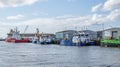 Commercial ships and boats unloading cargo in the seaside town of Great Yarmouth