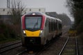 Greater Anglia Flirt Train Approaches Wymondham Station in Rain