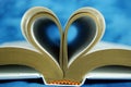 Bible pages curled as a heart