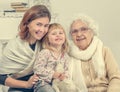 Greatgrandmother with two greatgranddaughter and granddaughter Royalty Free Stock Photo