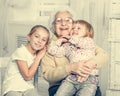 Greatgrandmother with two greatgranddaughters Royalty Free Stock Photo