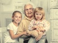 Greatgrandmother with two greatgranddaughters Royalty Free Stock Photo