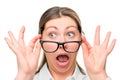 Greatly shocked woman with glasses