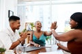 Greatness happens when you give it your all. a group of businesspeople giving each other high five during a meeting in a Royalty Free Stock Photo