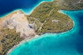 Grebastica turquoise bay and Ostrica historic defence wall ruins aerial view