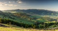 Gree hills and meadows at Pieniny Mountains. Beautiful wide spring panoramic view from. Wysoki Wierch, Poland and Slovakia