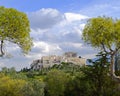 Greece, Acropolis of Athens view from Pnyx hill between pine trees