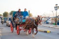 GREECE, AEGINA ISLAND - NOVEMBER 30, 2019: Open carriage with horses on the road