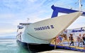 Greece in April, the island of Thassos, a large ferry, transports people and cars that sail from the city of Keramoti to the Royalty Free Stock Photo