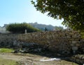 Greece, Athens, Ancient Agora, the wall of the Adrian\'s library and the view on the Acropolis Royalty Free Stock Photo