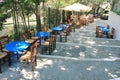 Empty chairs and tables of a traditional restaurant in Athens, Greece Royalty Free Stock Photo