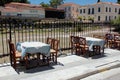 Empty chairs and tables of a traditional restaurant in the touristic district of Plaka Royalty Free Stock Photo