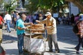 GREECE, ATHENS - OCTOBER 07, 2018 Donut seller, koulourakia, on the street in Plaka district