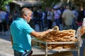 GREECE, ATHENS - OCTOBER 07, 2018 Donut seller, koulourakia, on the street in Plaka district