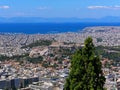 Greece, Athens panoramic view with Parthenon temple on acropolis hill, Plaka old neighborhood and Saronic golf Royalty Free Stock Photo